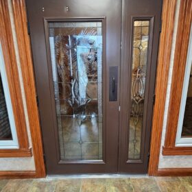 Funeral home Irwin PA ThermaTru door operable sidelites wood trim